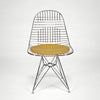 Wire Side Chair (DKR) with Seat Cushion by Charles and Ray Eames sold by the modern archive