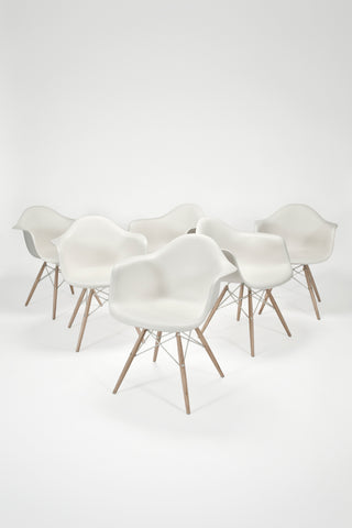 Molded Plastic Armchairs with Dowel Base <br/>by Charles & Ray Eames