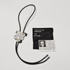 Futura Bolo Tie by Ettore Sottsass for Acme Studios sold by the modern archive