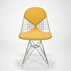 Wire Side Chair (DKR) with "Bikini" Upholstery by Charles and Ray Eames sold by the modern archive